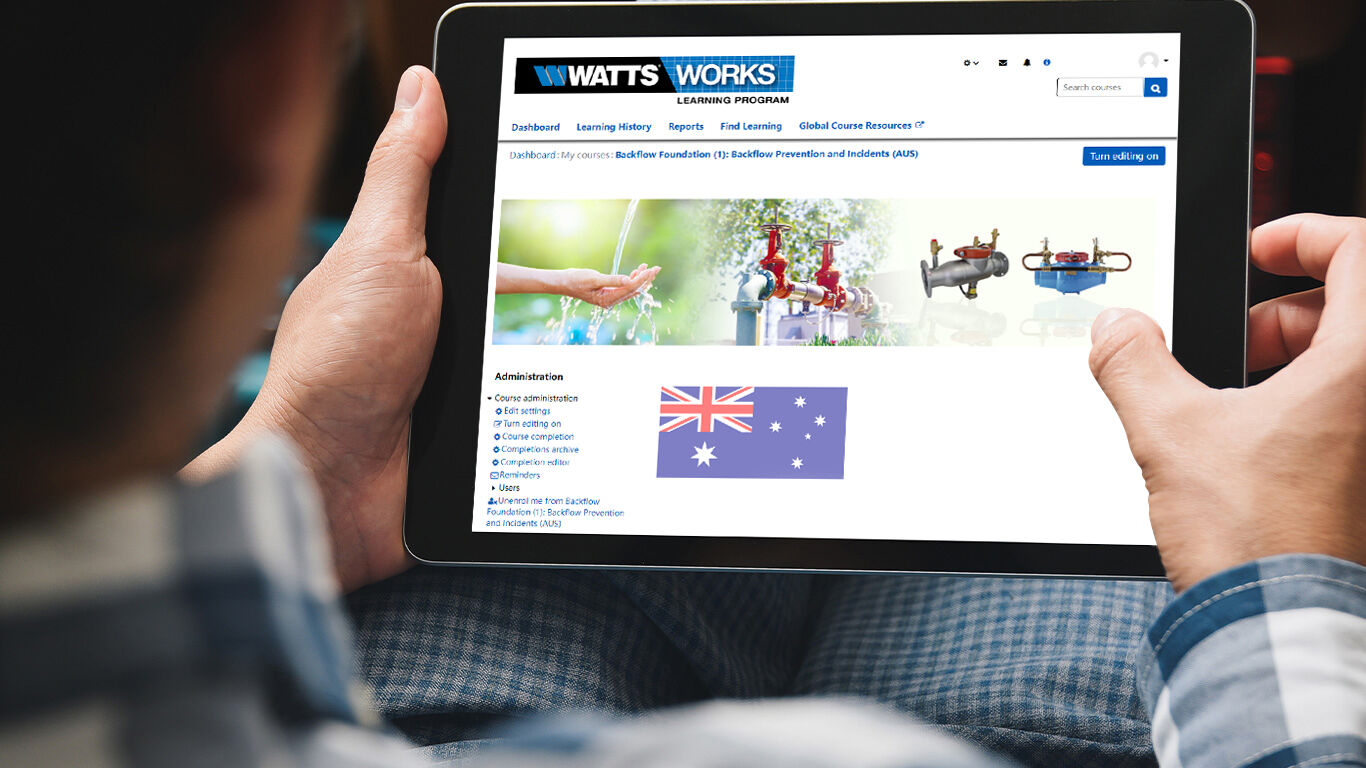 Man on ipad accessing the Australian Watts Works Online program